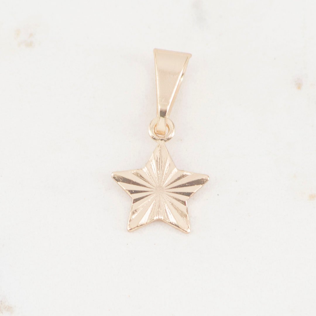 26058-DIJE-ESTRELLA-DESTELLO.jpg DIJE ESTRELLA DESTELLO - Imagen 1