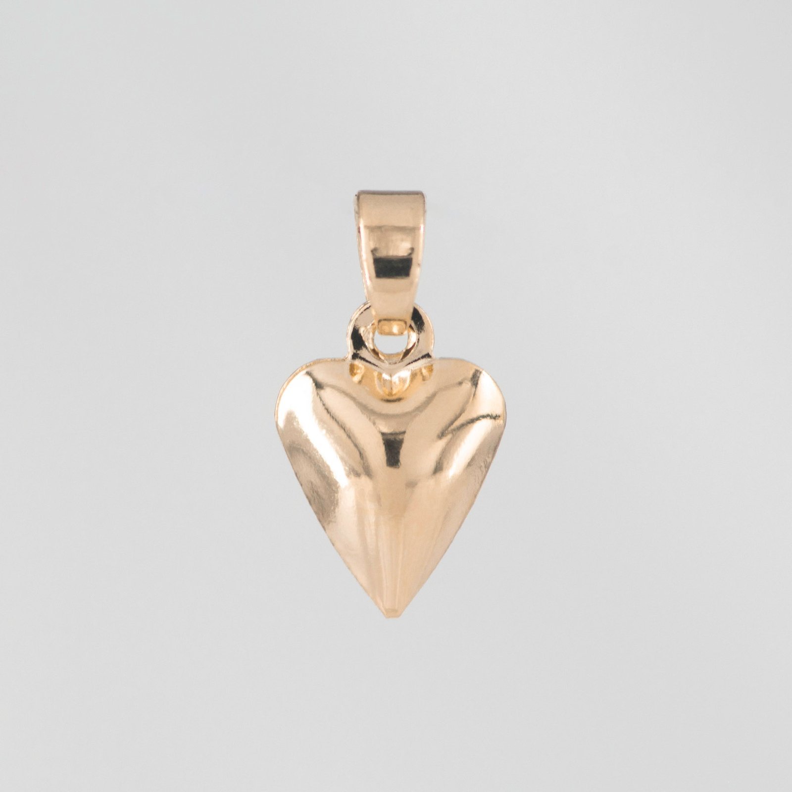 27132-DIJE-CORAZON-LISO-RELIEVE.jpg DIJE CORAZON LISO RELIEVE - Imagen 1